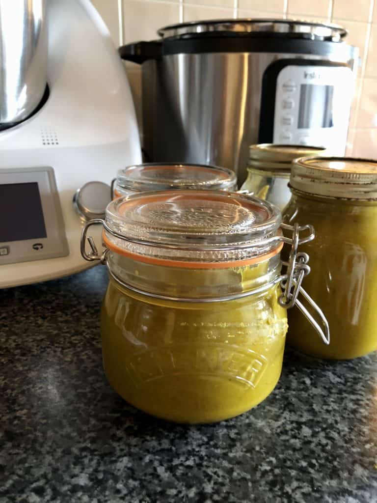 Instant Pot Vegetable Stock Paste recipe by Feisty Tapas - jars with Thermomix and Instant Pot in the background