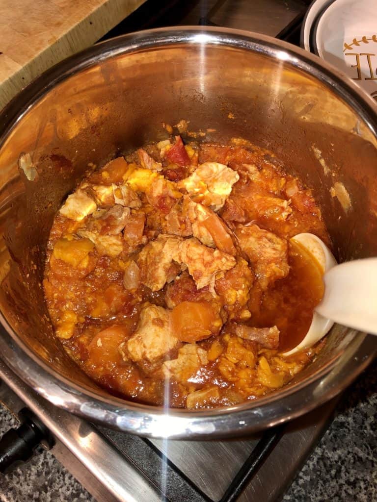 Photo of the pressure cooked Turkey stew, ready to serve, seen inside the Instant Pot's stainless steel inner pot
