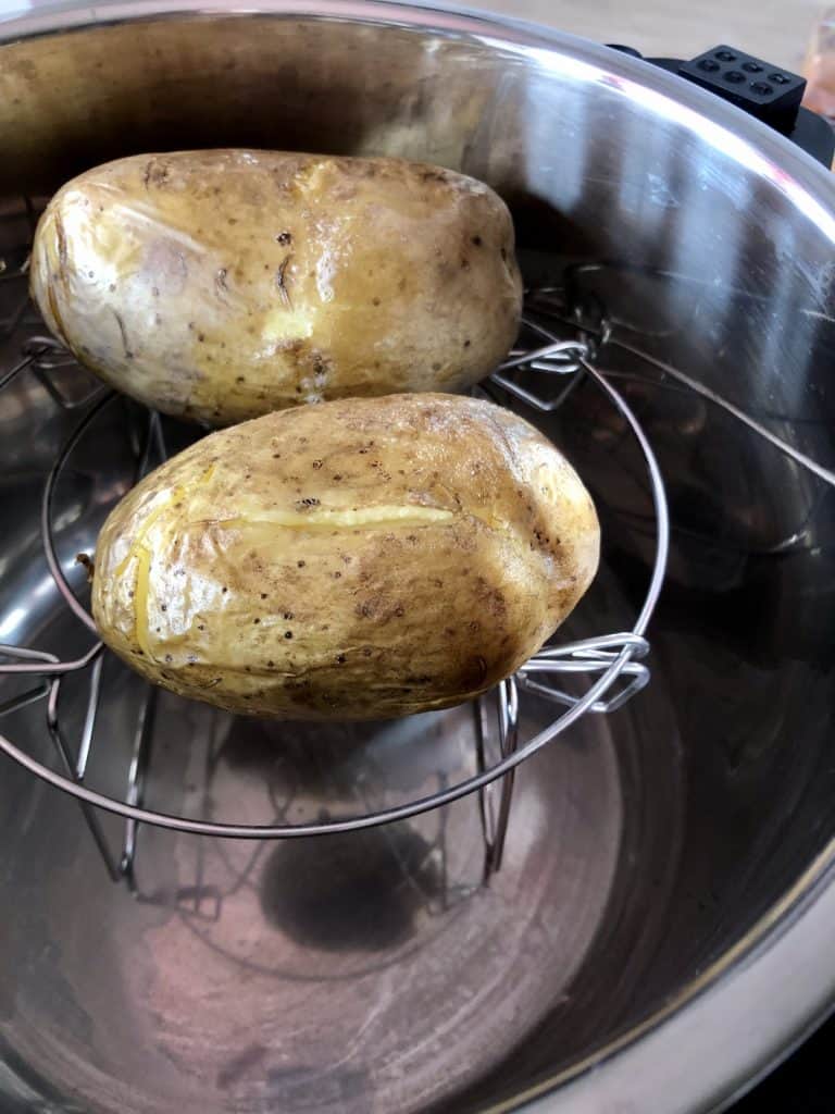 Jacket potatoes ready to bake in Instant Pot Duo Crisp - Feisty Tapas