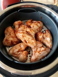 Chicken wings in Instant Pot Duo Crisp's air fryer basket