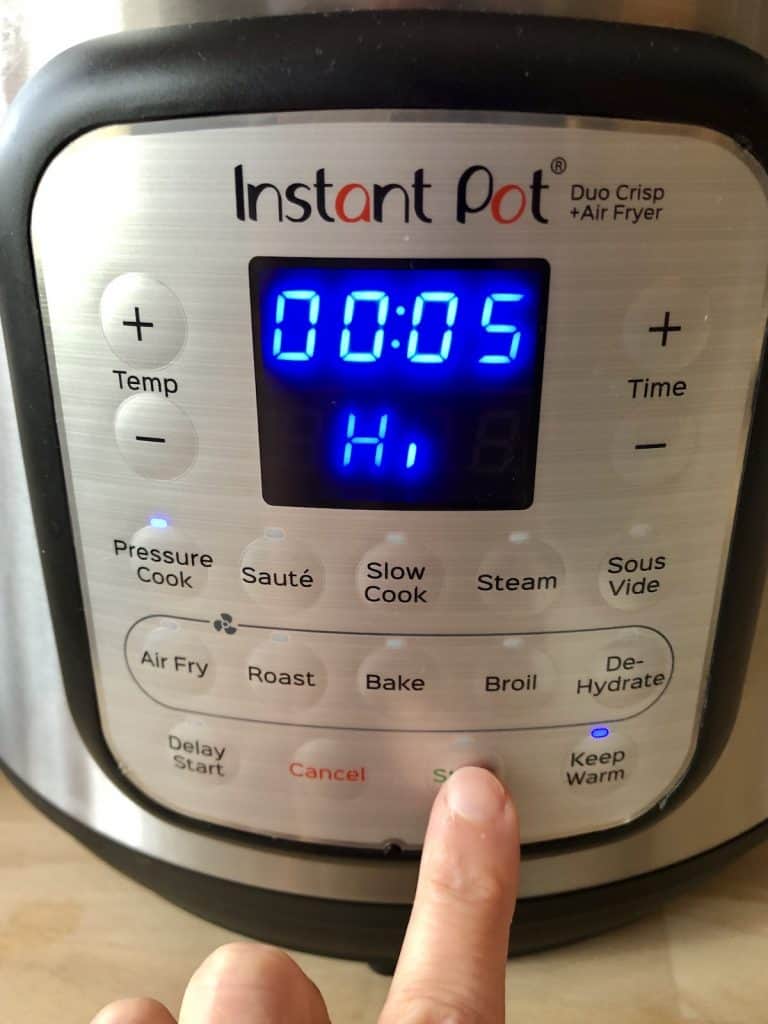 Instant Pot Duo Crisp programmed with 5 minutes pressure cooking time for gammon rice - pressing Start
