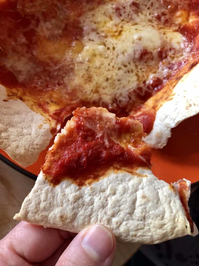 Cut a triangle and start digging into your Air Fryer Tortilla Pizza