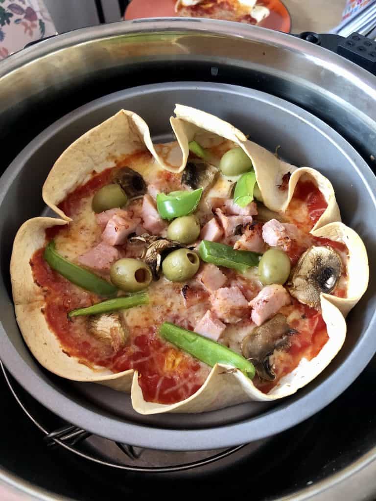 Tortilla Wrap Pizza in Instant Pot Duo Crisp topped with olives and green peppers