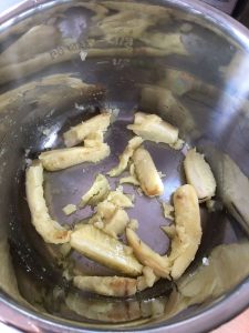 Roughed up parsnips in the Instant Pot Duo Crisp's inner pot ready to air fry