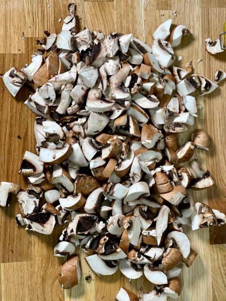 Chopped up bite-sized mushrooms for vegan mushroom stew