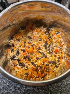 Pressure Coooker Mexican Rice in stainless steel inner pot just after pressure cooking, looking from above