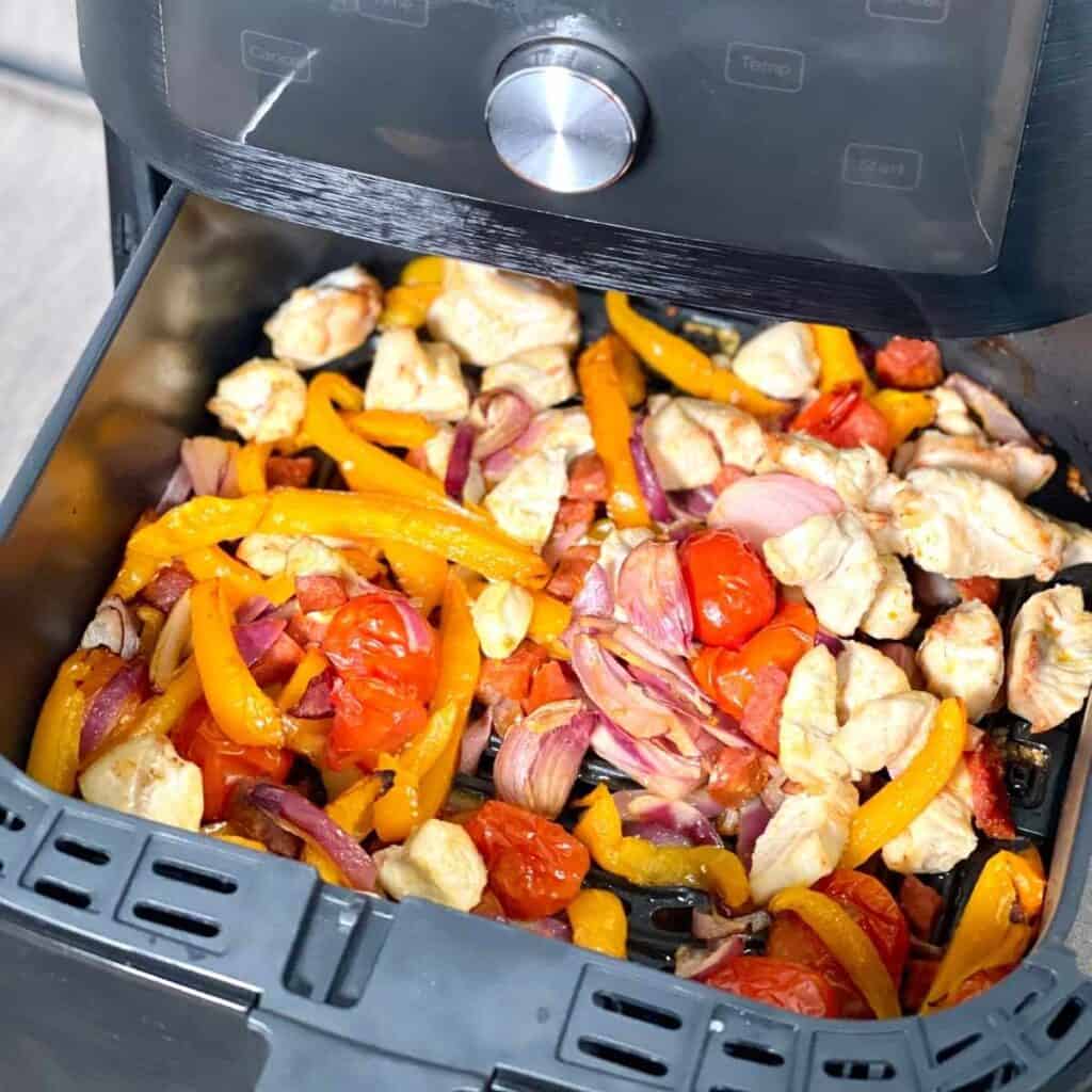 Air Fryer Chicken and Chorizo seen in the drawer / basket of the Instant Vortex Air Fryer