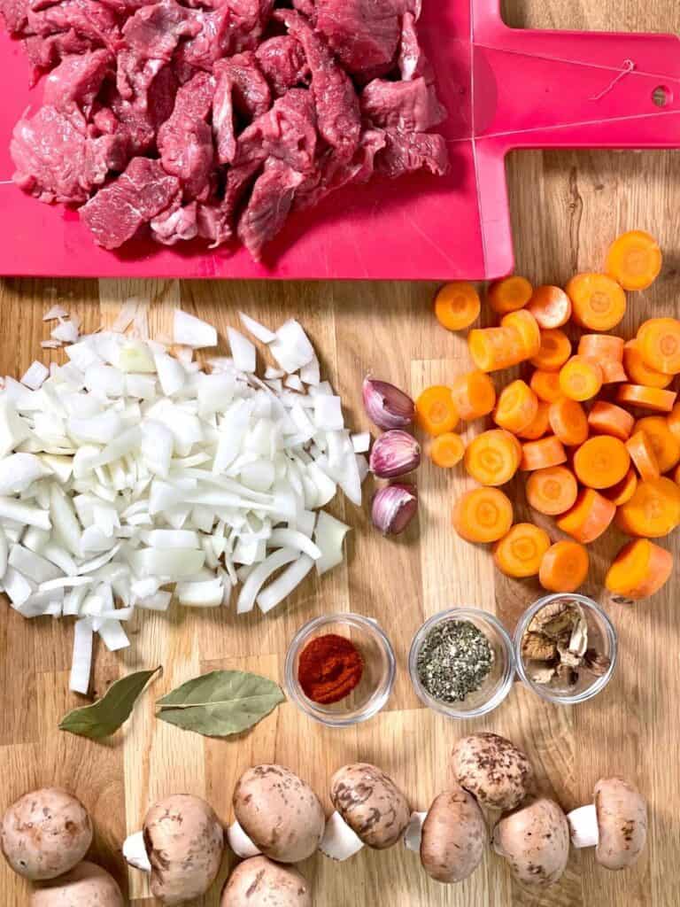 ingredients for Pressure Cooker Beef Stew and Dumplings after chopping and slicing