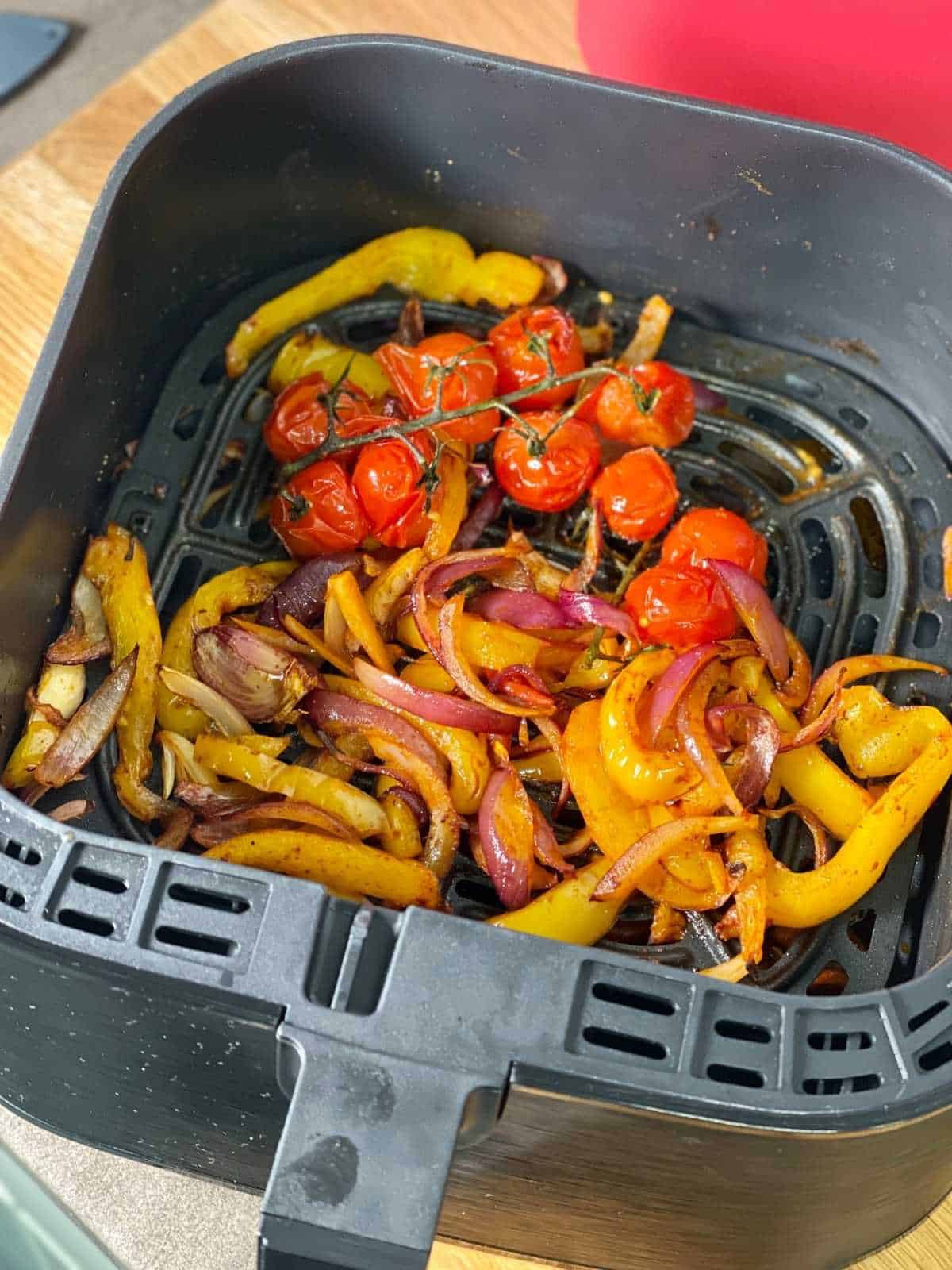 Roasted vegetables seen from above in the drawer of the Instant Vortex 4 in 1 air fryer
