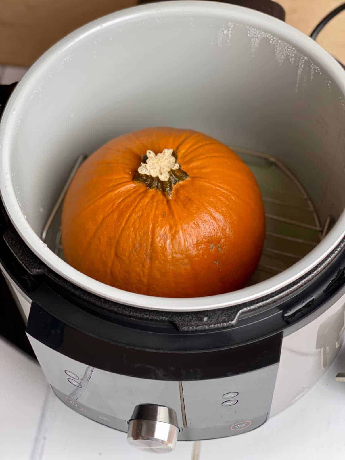 Photo of a Pumpkin after pressure cooking still inside pressure cooker