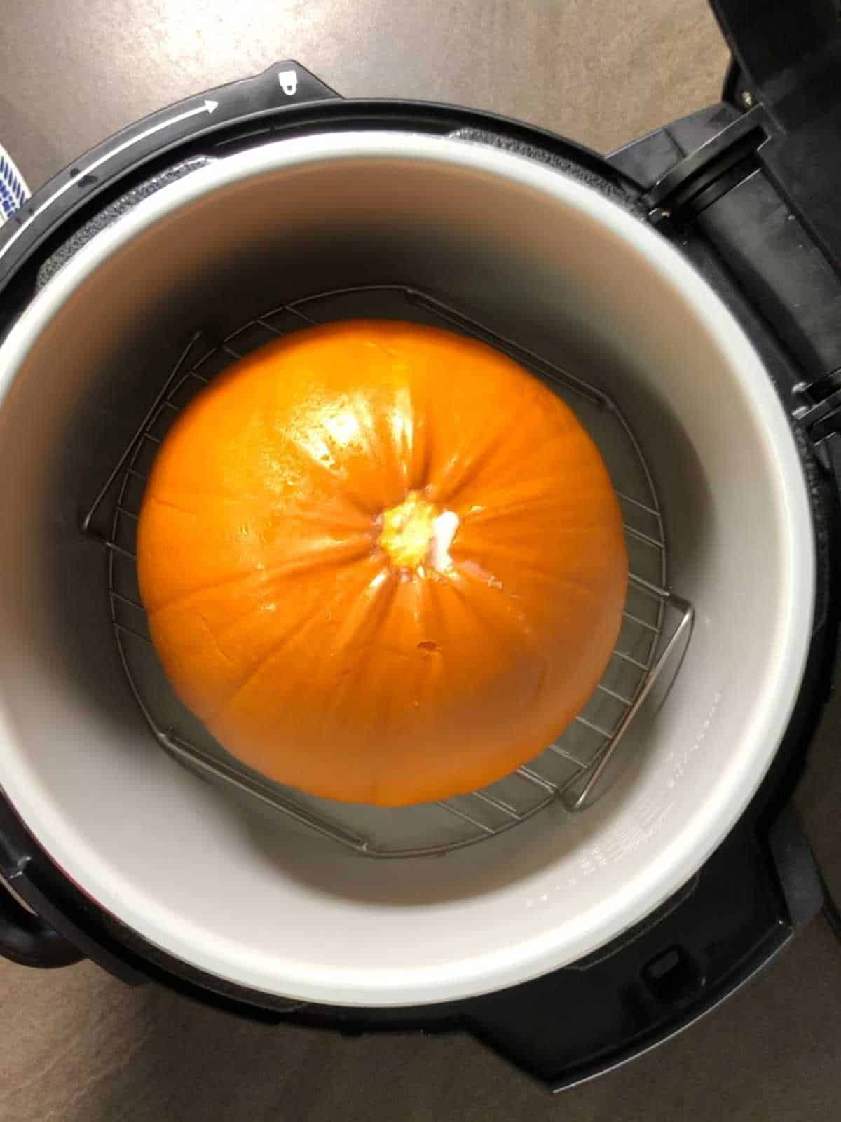 Photo of the equipment necessary to pressure cook a whole raw pumpkin in an instant pot / Ninja electric pressure cooker