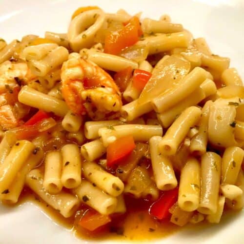 Photo of delicious Instant Pot Seafood Pasta on a white plate