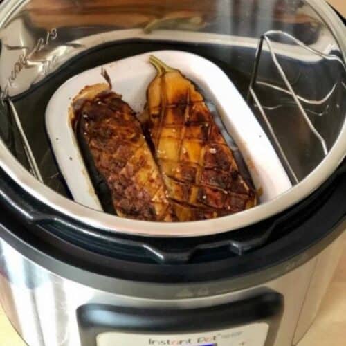 Photo of the Soy-Glazed Aubergine sliced in half and seen inside the Instant Pot Duo Crisp