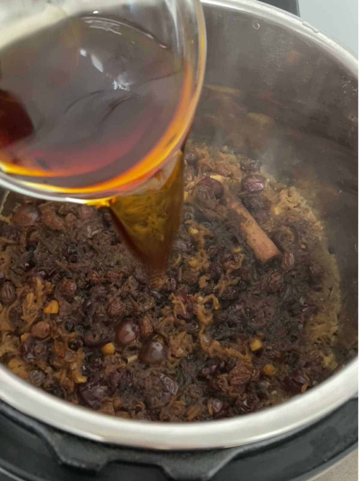 Photo of step 6 Pressure Cooker Christmas Mincemeat - adding the rum