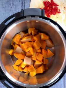 Photo of Step 2 - deseed and cut butternut squash in chunks, seen from above