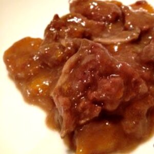 The beef bourguignon served on a white plate, bad blurry photo from 2012, you're not missing much let me tell you but the recipe itself is delicious