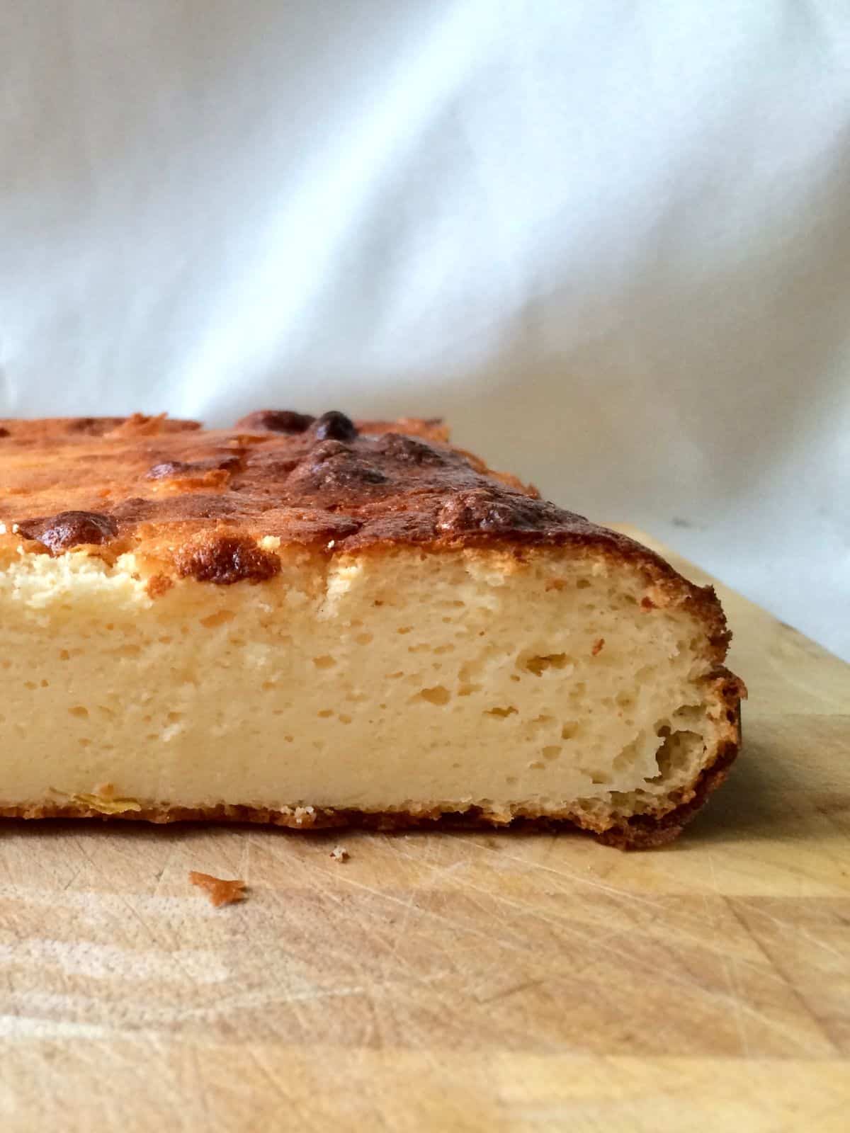 Close-up of the inside of the lemon quark cake and its crust
