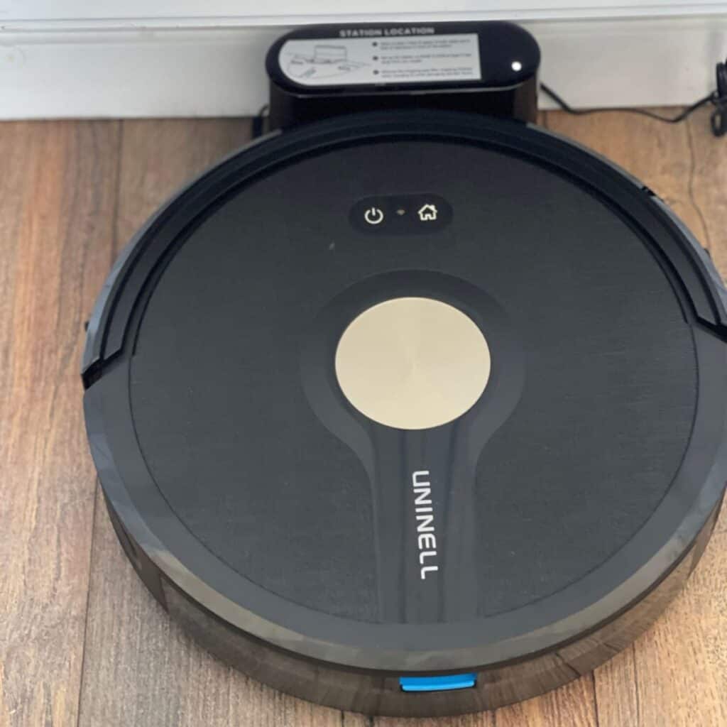 Black robot Uninell robot vacuum cleaner with mop, budget friendly and does the job. Tried and tested for the last few months
